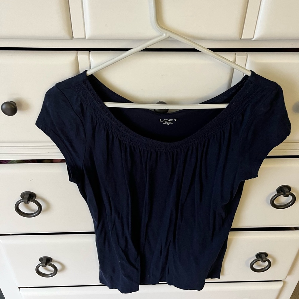 Size medium blue top from the loft!